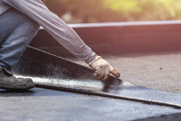 Professional Waterproofing technician working in Minneapolis, KS